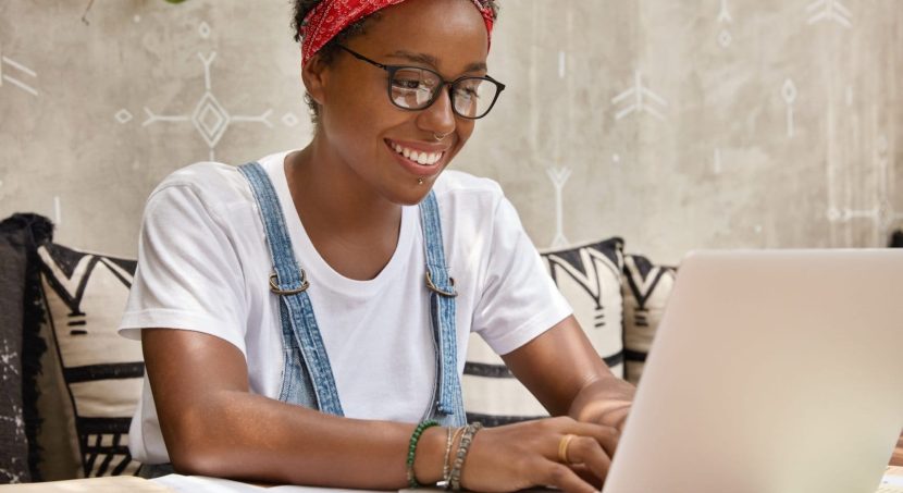 stylish businesswoman works laptop computer cozy coffee shop keyboards information scaled 1